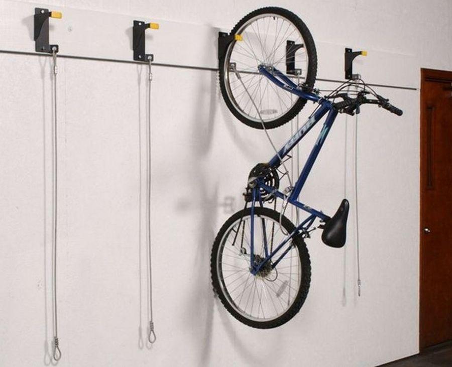 Как повесить велосипед на стену в гараже своими руками: фото, вертикально, видео