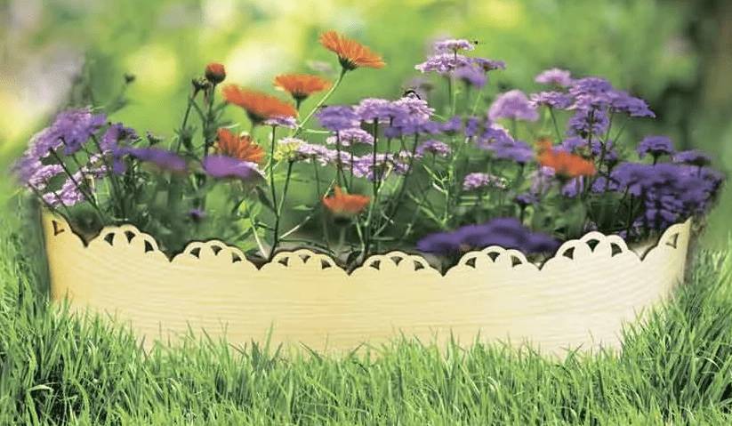 Грядки из бордюрной ленты: фото, как сделать, установка