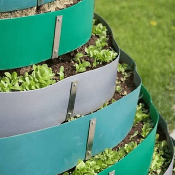 Грядки из бордюрной ленты: фото, как сделать, установка