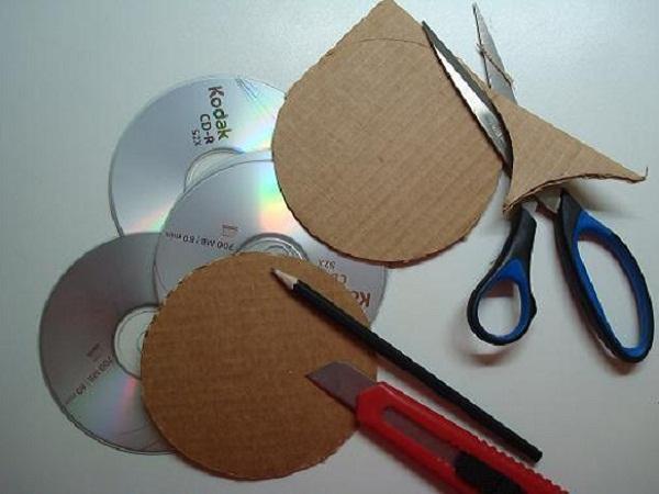 поделки из дисков своими руками подставка под горячее своими руками